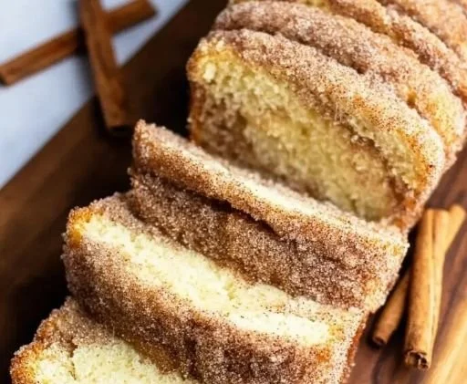 Delicious cinnamon sugar donut bread loaf with a golden crust.